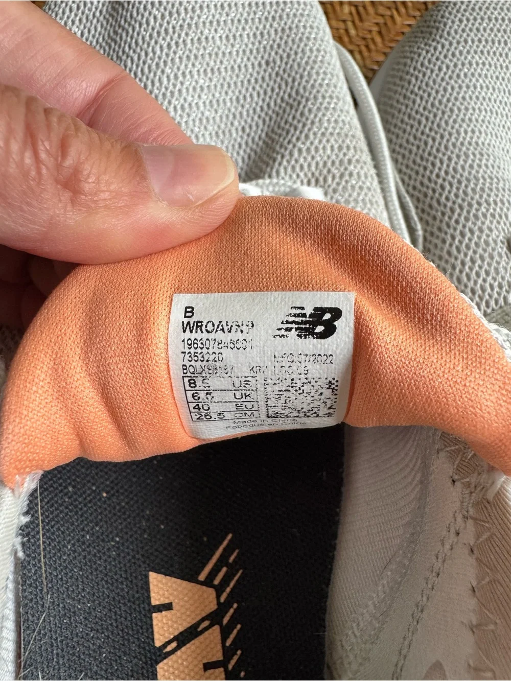 New Balance Women’s White Sneakers with Coral Accents